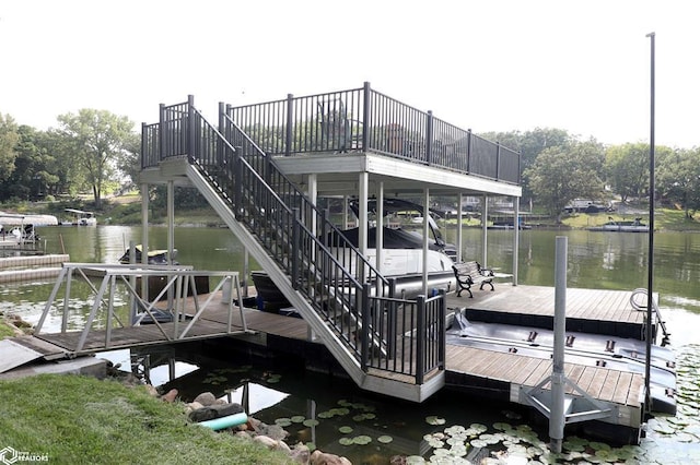 dock area featuring a water view and boat lift