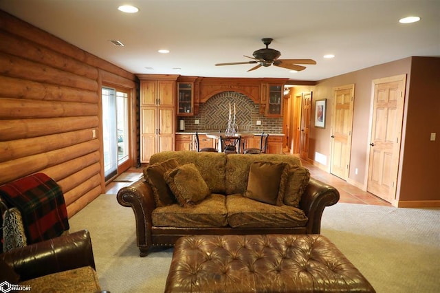 living area featuring recessed lighting, rustic walls, light carpet, ceiling fan, and baseboards