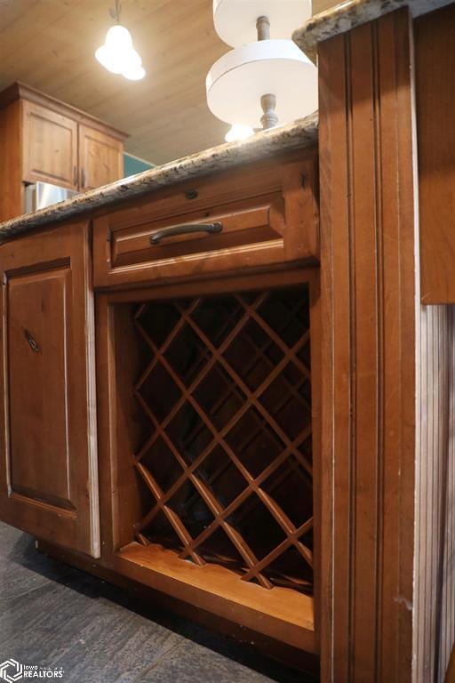 wine area with dark wood-style floors