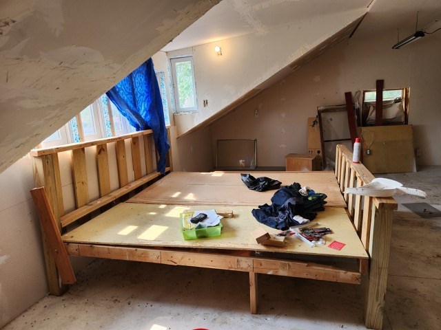 605 High St, Linneus, MO 64653 - additional living space featuring vaulted ceiling