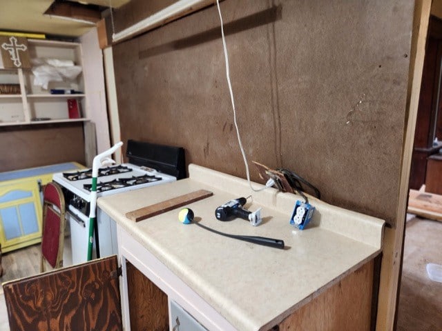 605 High St, Linneus, MO 64653 - kitchen with white gas stove
