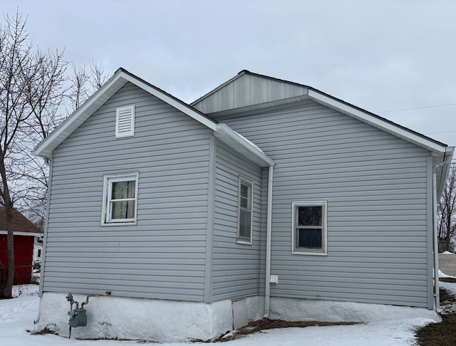 view of snow covered property