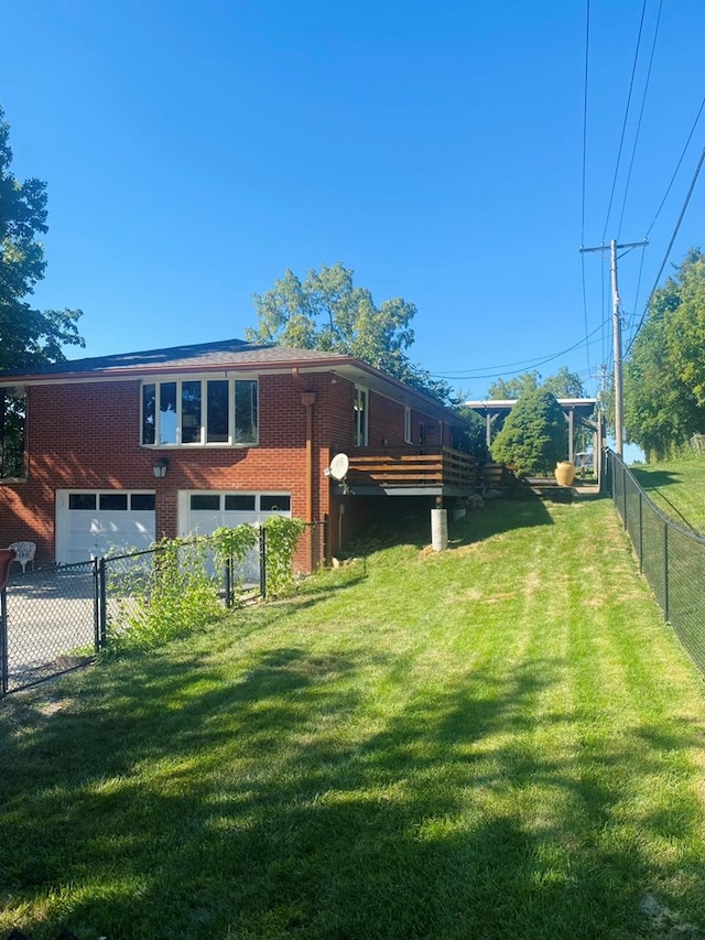 view of yard featuring a garage