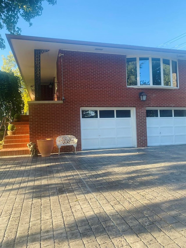 exterior space with a garage