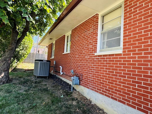 view of home's exterior featuring central AC unit