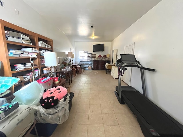 exercise area with light tile patterned floors