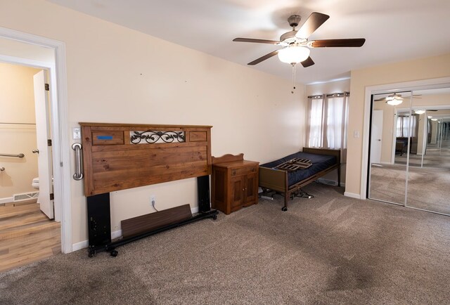 500 W Santa Fe St, Marceline, MO 64658 - carpeted bedroom with ensuite bathroom and ceiling fan