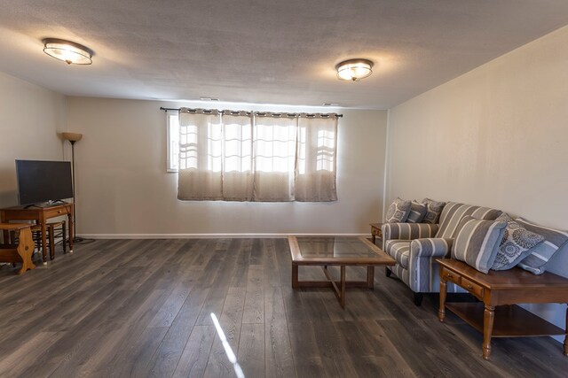 500 W Santa Fe St, Marceline, MO 64658 - sitting room featuring dark hardwood / wood-style flooring and a textured ceiling