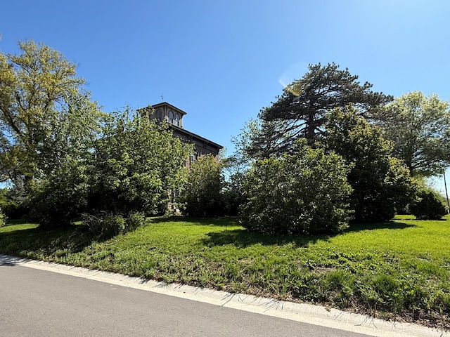 101 E Burton St, Kirksville, MO 63501 - view of side of property with a yard