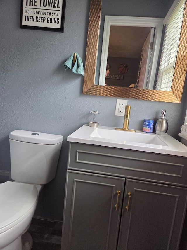 1701 Boyd, Chillicothe, MO 64601 - bathroom featuring vanity and a textured wall