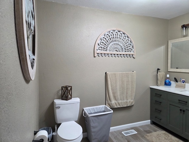 1701 Boyd, Chillicothe, MO 64601 - bathroom featuring wood finished floors and vanity