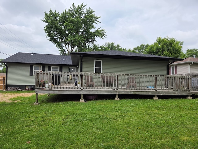 1701 Boyd, Chillicothe, MO 64601 - back of property with a lawn and a wooden deck