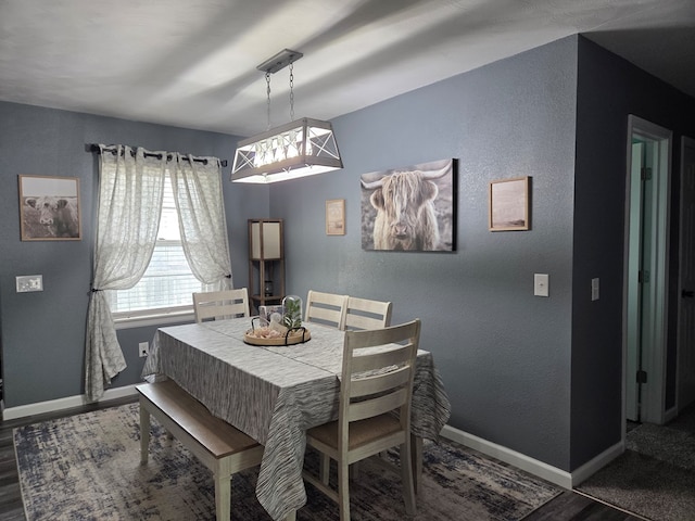 1701 Boyd, Chillicothe, MO 64601 - dining room with wood finished floors and a textured wall