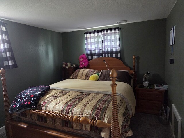 1701 Boyd, Chillicothe, MO 64601 - carpeted bedroom featuring a textured ceiling