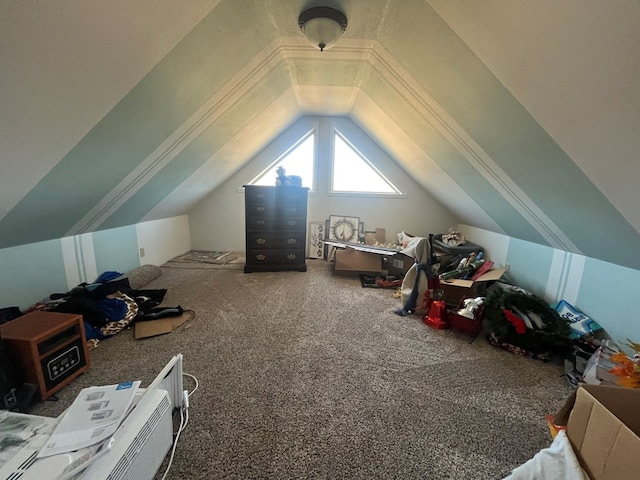 bonus room featuring lofted ceiling and carpet floors