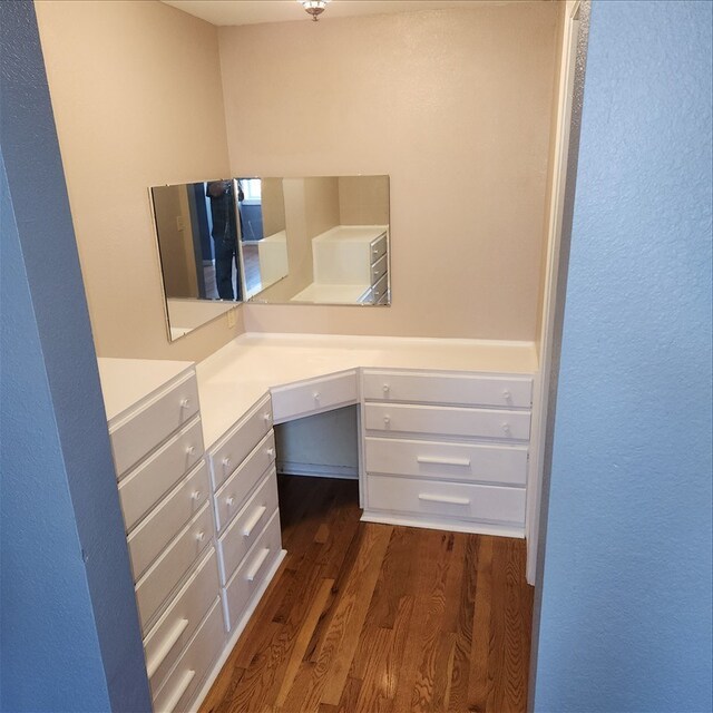 117 N Rollins St, Macon, MO 63552 - unfurnished office with built in study area and dark wood-style flooring