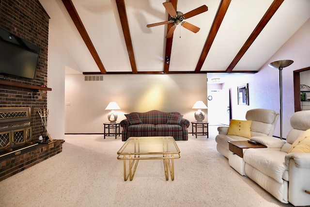 carpeted living room with beamed ceiling, ceiling fan, and high vaulted ceiling