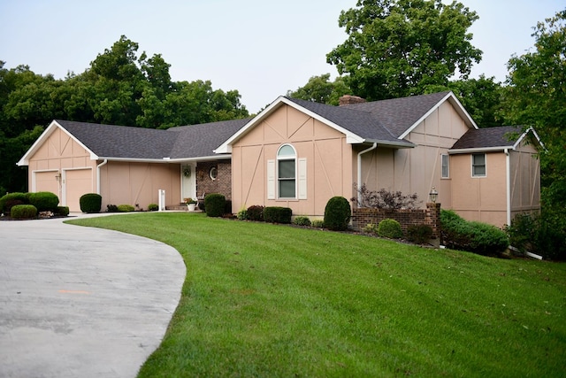 single story home with a garage and a front yard