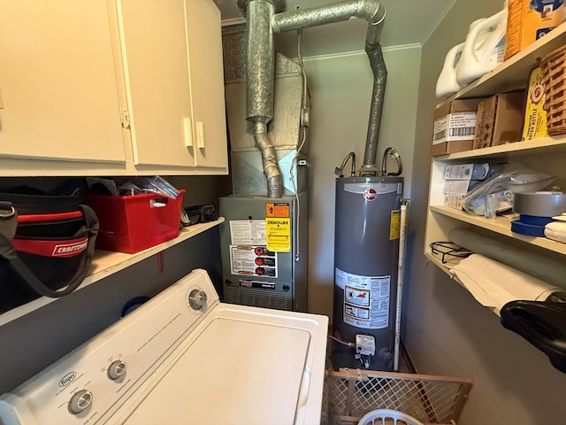 4 Grim Ct N, Kirksville, MO 63501 - washroom featuring washer / dryer, water heater, cabinet space, and heating unit