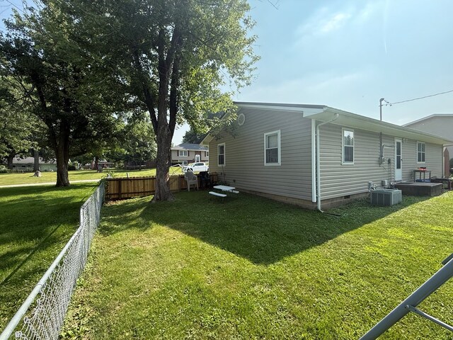 4 Grim Ct N, Kirksville, MO 63501 - view of property exterior featuring crawl space and a central air condition unit