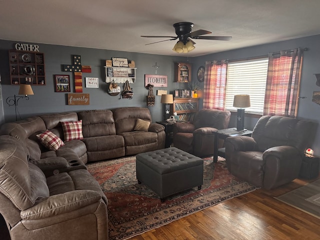 living area featuring ceiling fan and wood finished floors