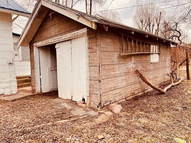 view of outbuilding featuring an outdoor structure