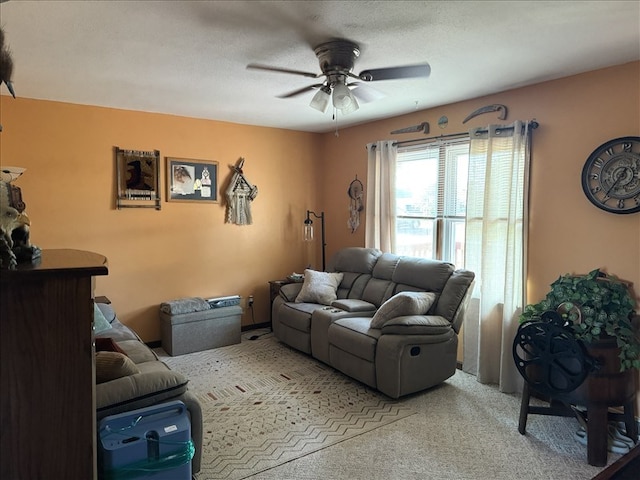 816 Locust St, Macon, MO 63552 - carpeted living room featuring a ceiling fan