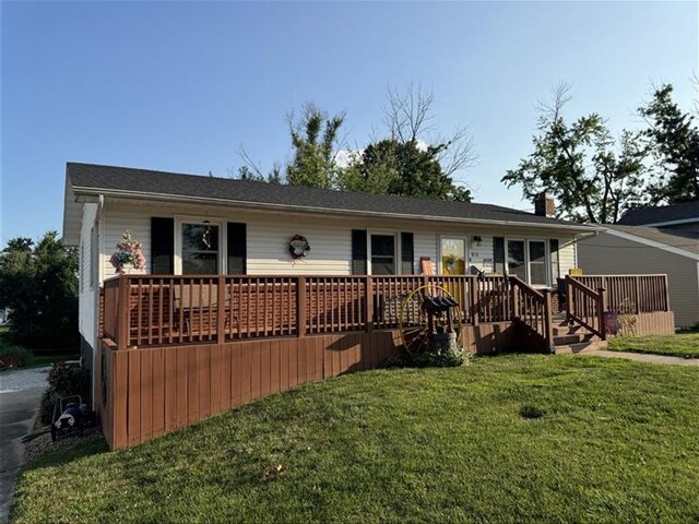 816 Locust St, Macon, MO 63552 - back of house with a yard and a chimney