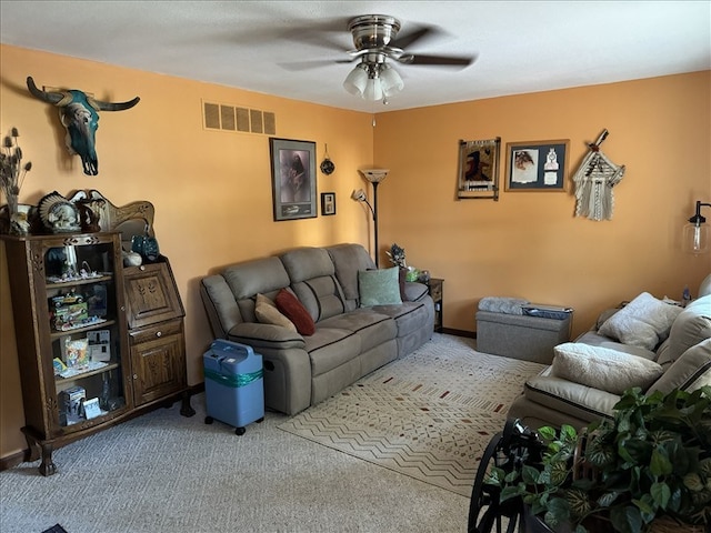 816 Locust St, Macon, MO 63552 - carpeted living area with a ceiling fan
