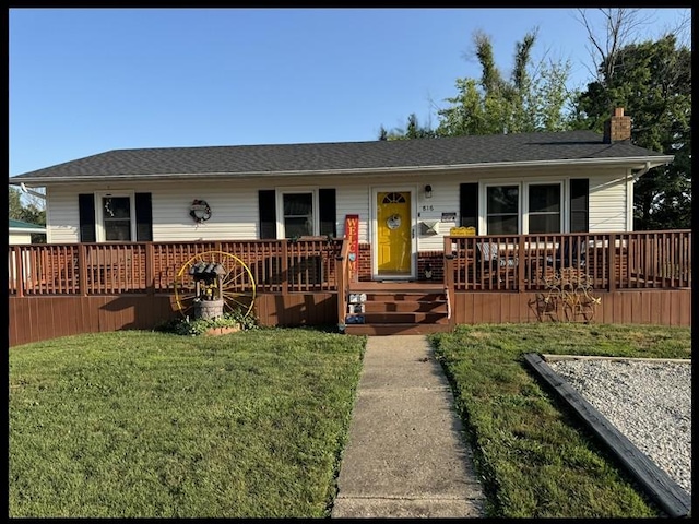 816 Locust St, Macon, MO 63552 - ranch-style house with a chimney and a front lawn