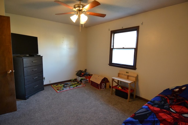 carpeted bedroom with ceiling fan