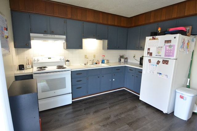 kitchen with sink, dark hardwood / wood-style flooring, blue cabinets, a textured ceiling, and white appliances