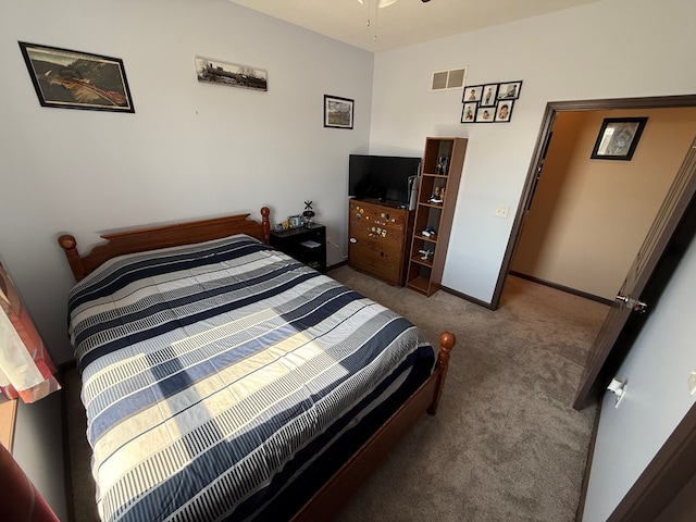 bedroom featuring visible vents, baseboards, and carpet flooring