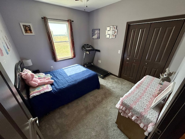 bedroom featuring a closet and carpet floors