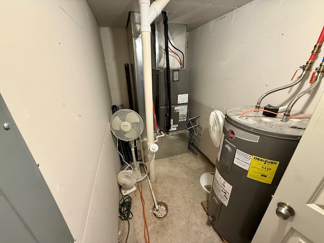 utility room featuring electric water heater