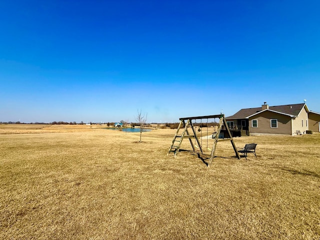 view of yard with a playground