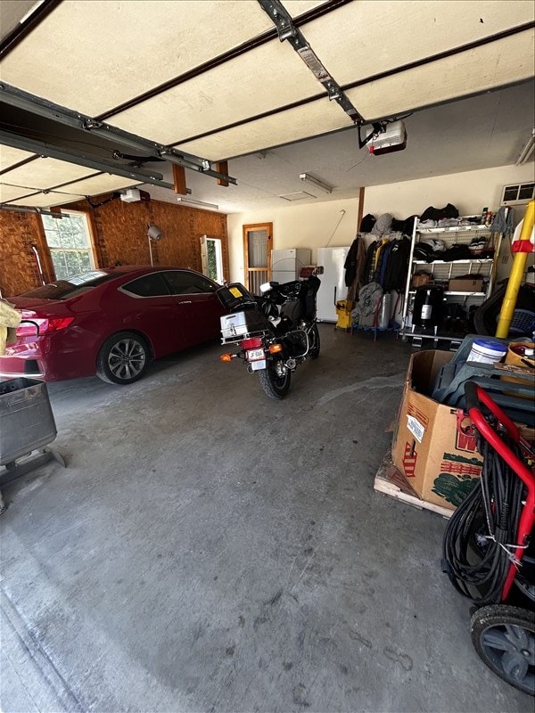 28730 State Highway T, Excello, MO 65247 - garage with a garage door opener