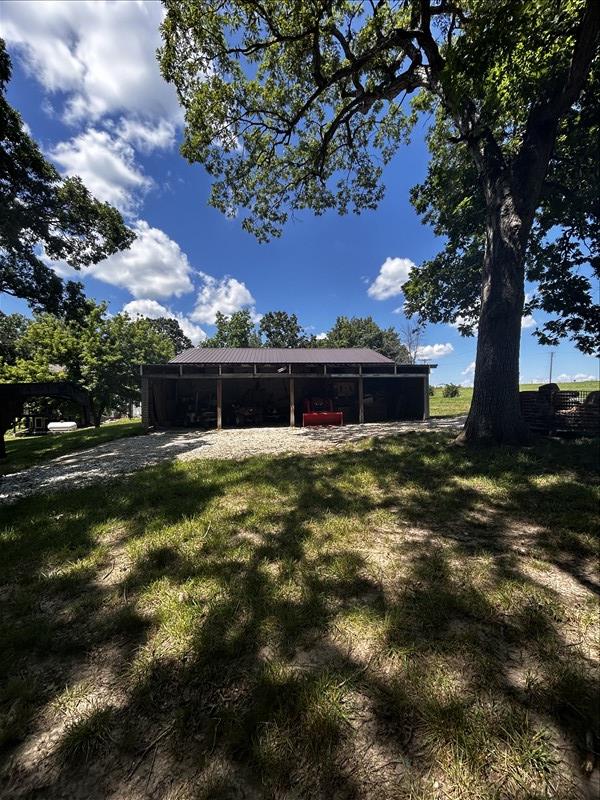 28730 State Highway T, Excello, MO 65247 - back of property with a lawn