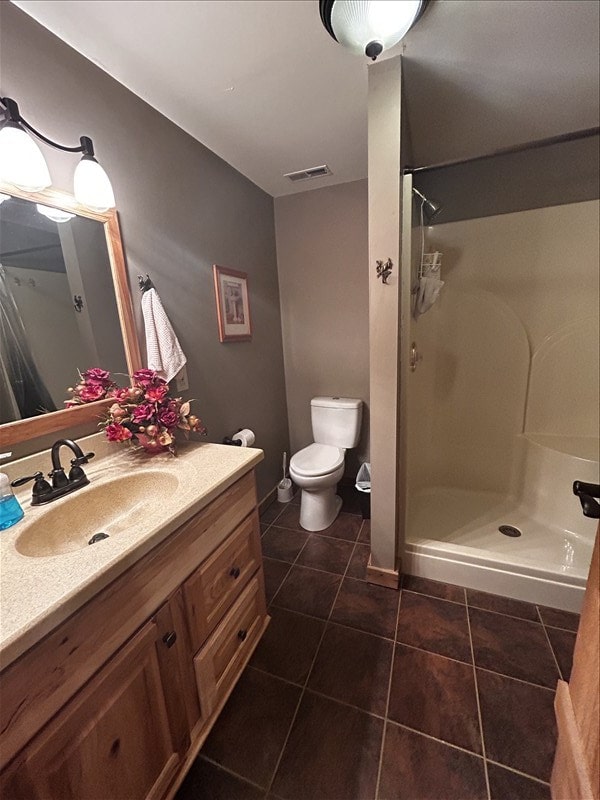 28730 State Highway T, Excello, MO 65247 - bathroom featuring tile patterned flooring, vanity, and a walk in shower