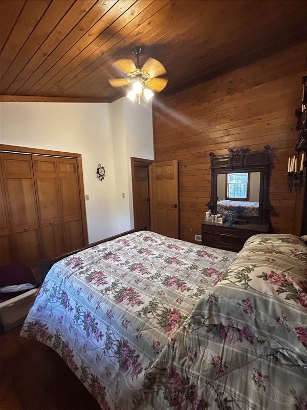 28730 State Highway T, Excello, MO 65247 - bedroom with wood ceiling, wooden walls, and a ceiling fan