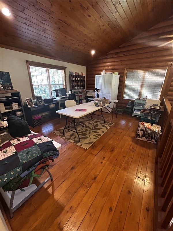 28730 State Highway T, Excello, MO 65247 - living area with log walls, vaulted ceiling, wooden ceiling, and hardwood / wood-style flooring