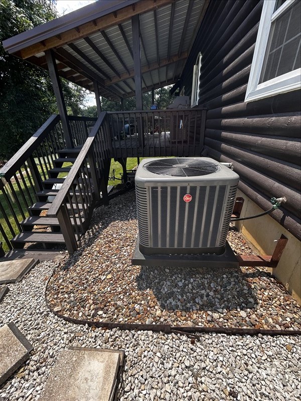 28730 State Highway T, Excello, MO 65247 - exterior view of a central AC unit and stairs