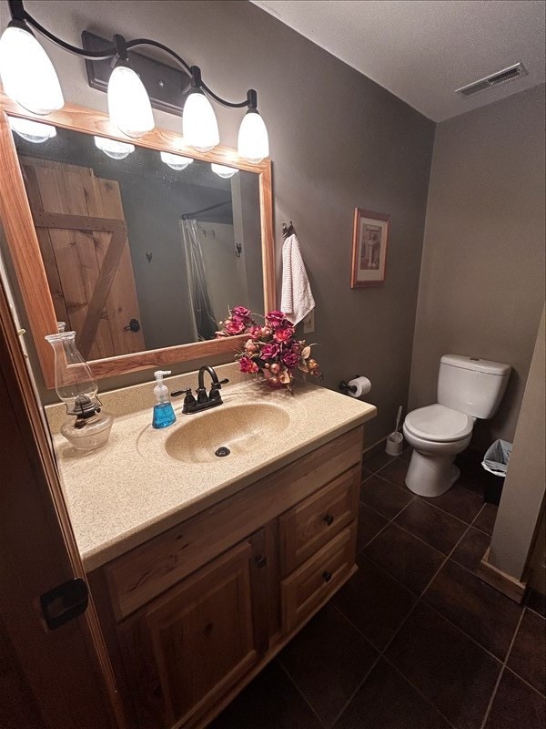 28730 State Highway T, Excello, MO 65247 - bathroom featuring vanity and tile patterned flooring