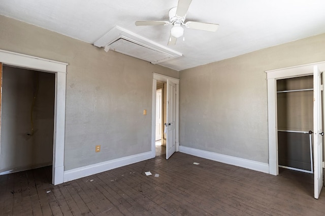 unfurnished bedroom featuring ceiling fan and dark hardwood / wood-style floors