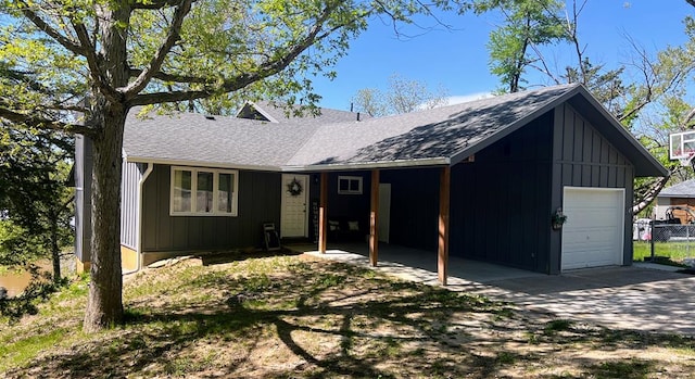 single story home featuring a garage