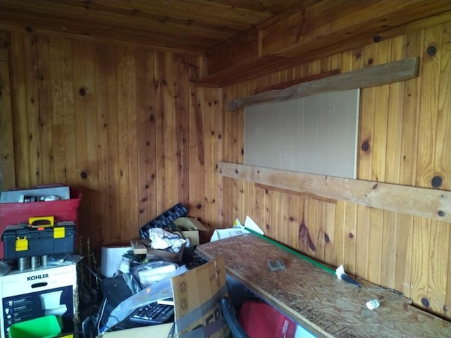 miscellaneous room with wood ceiling and wood walls