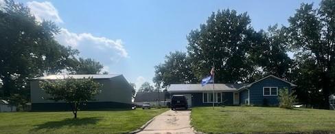 view of front of home with a front lawn