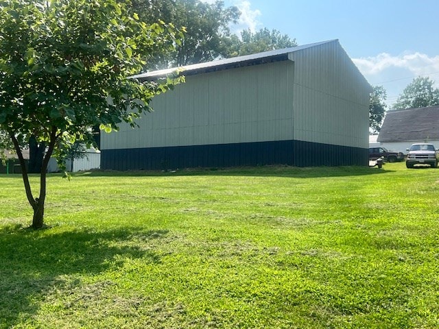 view of home's exterior featuring a yard