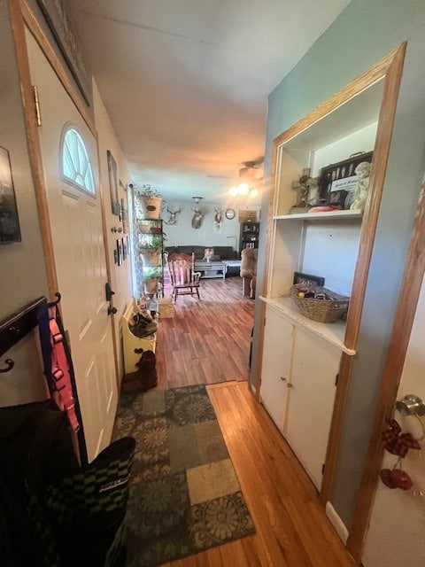 corridor featuring light hardwood / wood-style flooring