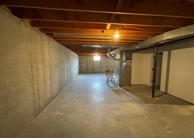 basement featuring heating unit